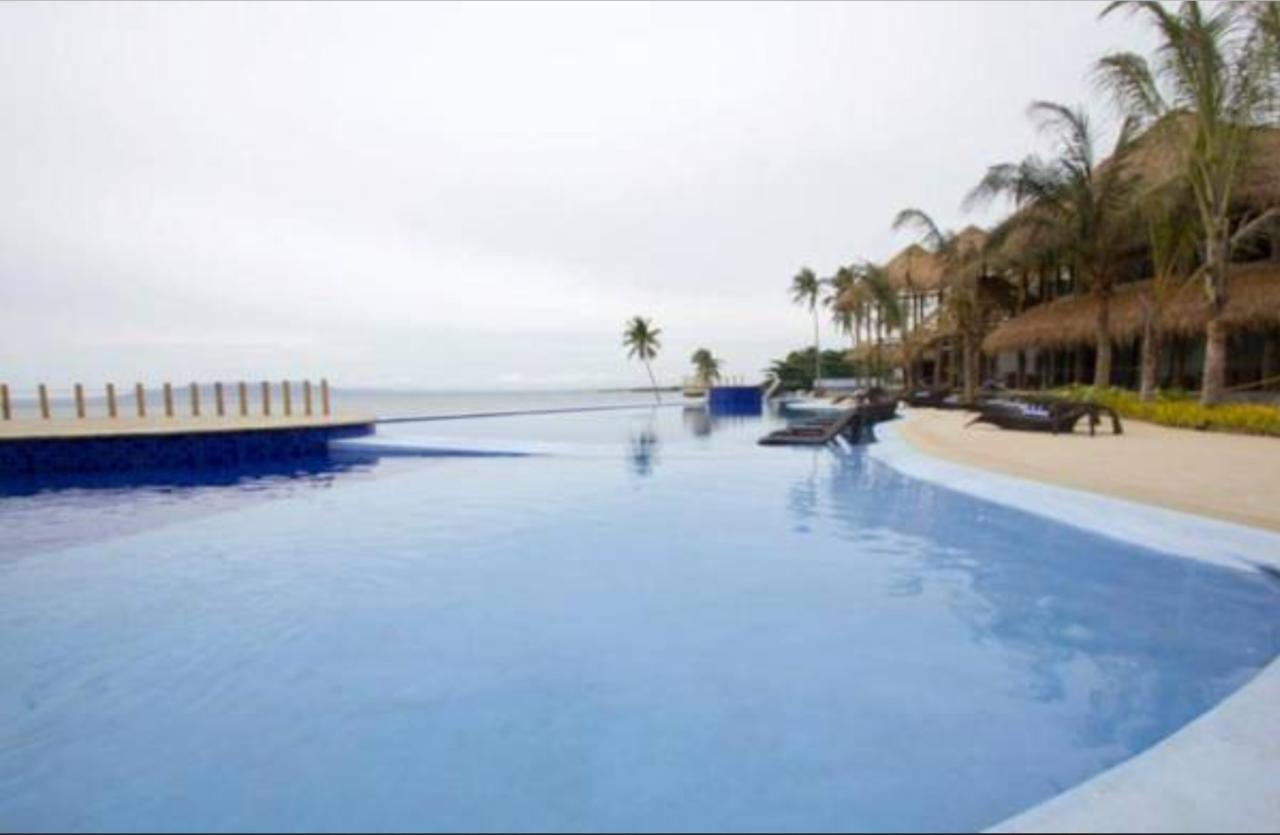 The Bellevue Resort Panglao Εξωτερικό φωτογραφία Infinity pool at the Iberostar Grand Hotel, Playa del Carmen, Mexico